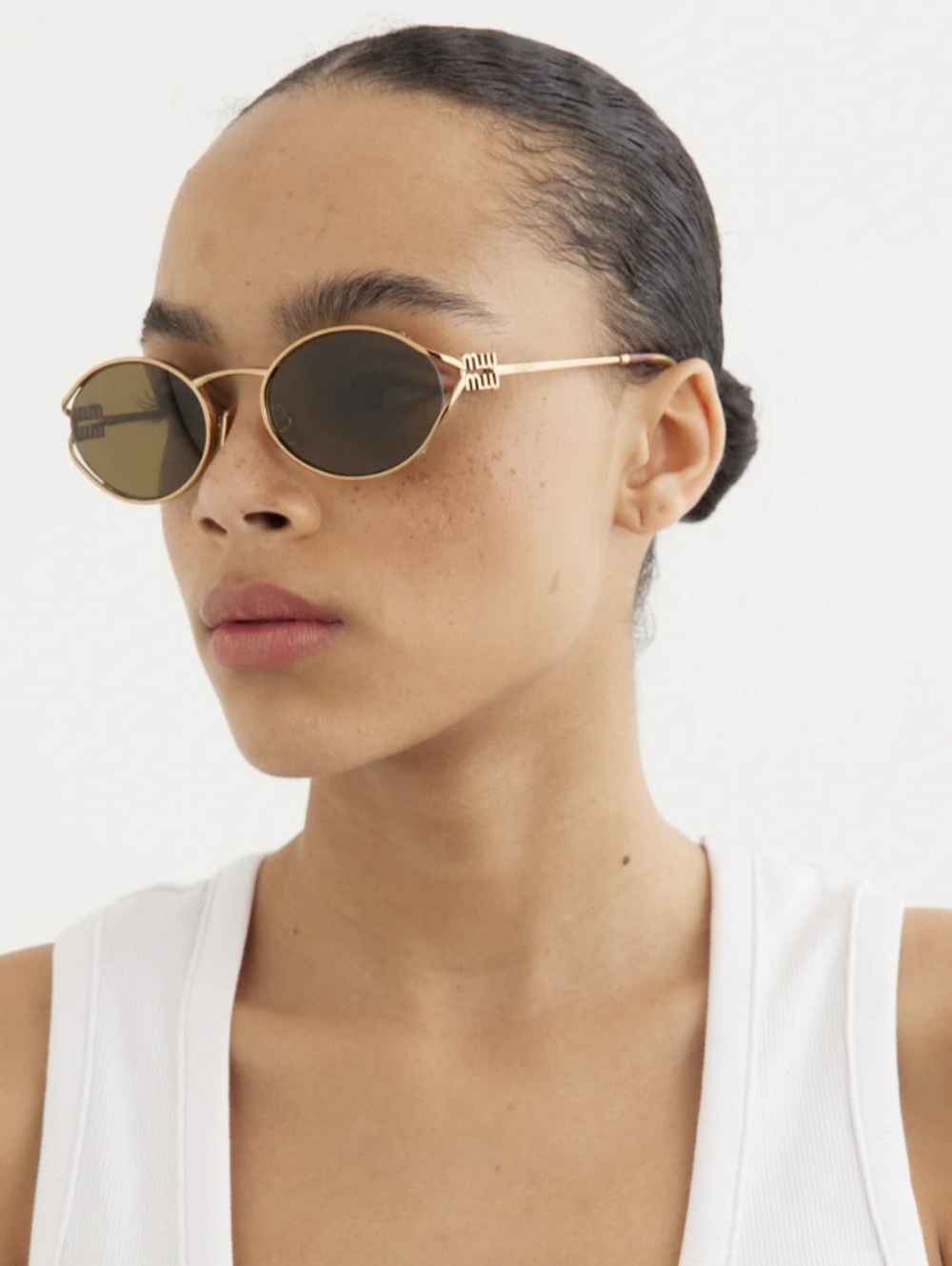 Miu Miu Smu52y Oval Sunglasses Gold/Brown